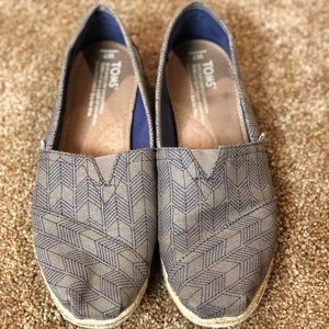 Grey patterned TOMS shoes